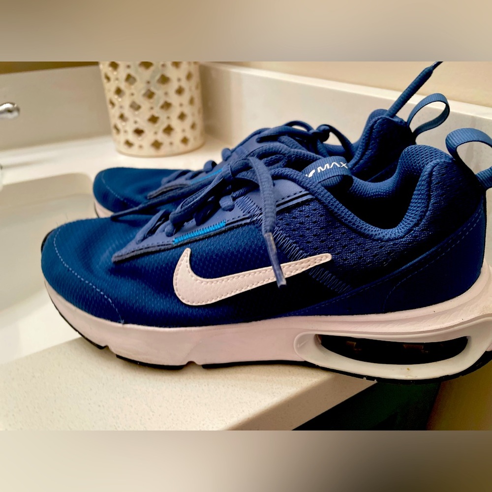 Navy and White Nike shoes